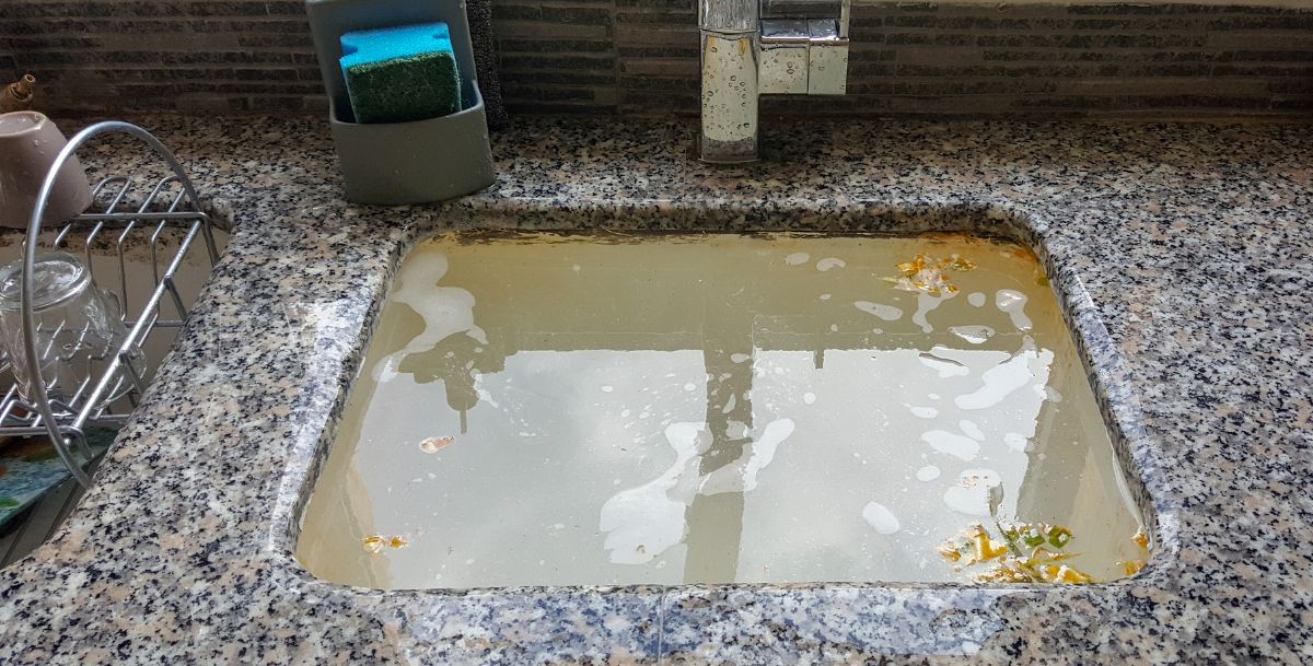 plumber for drain block